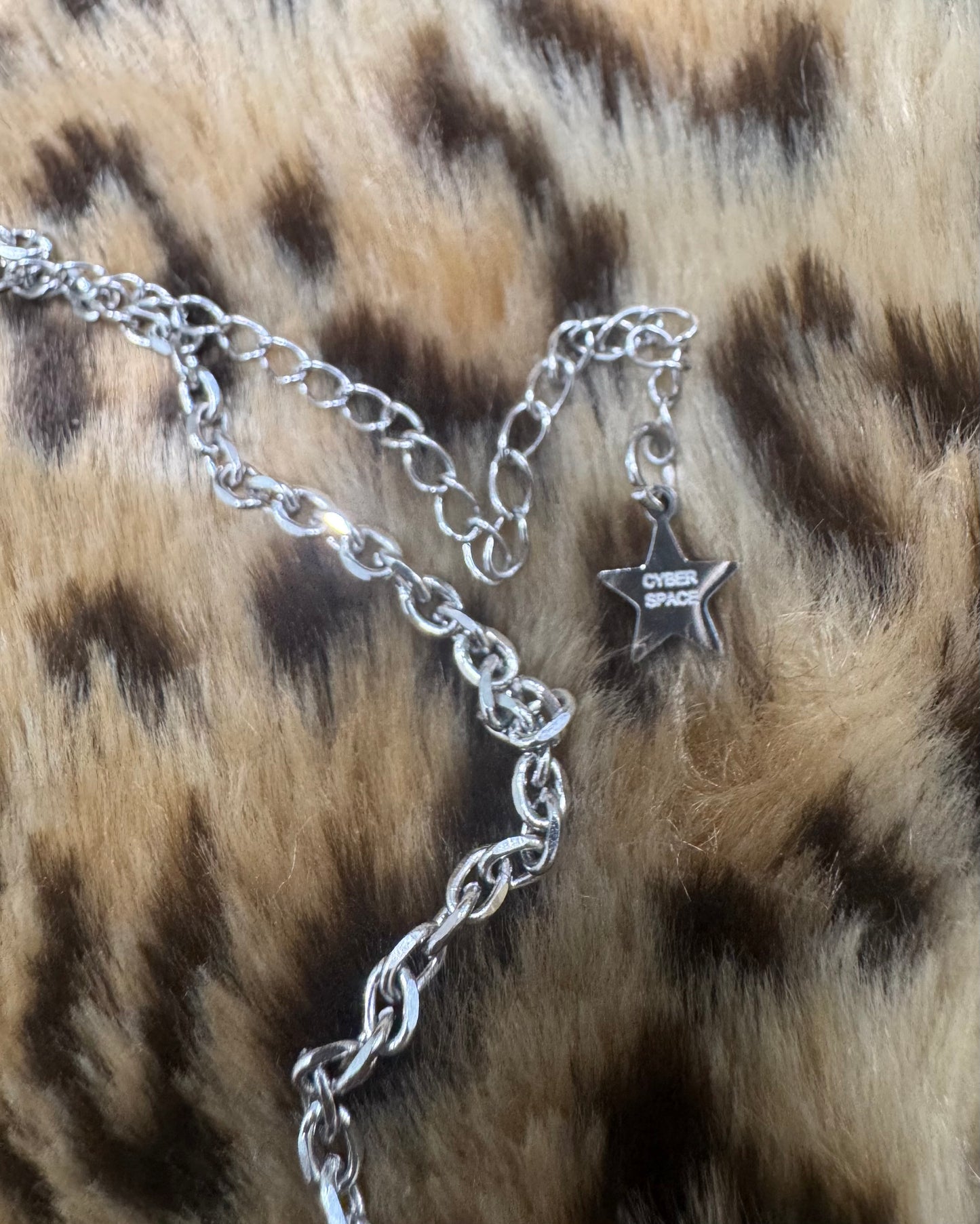 TOUGH LOVE BRASS KNUCKLES NECKLACE