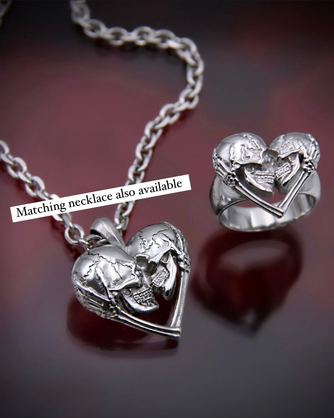 KISSING SKULLS RING