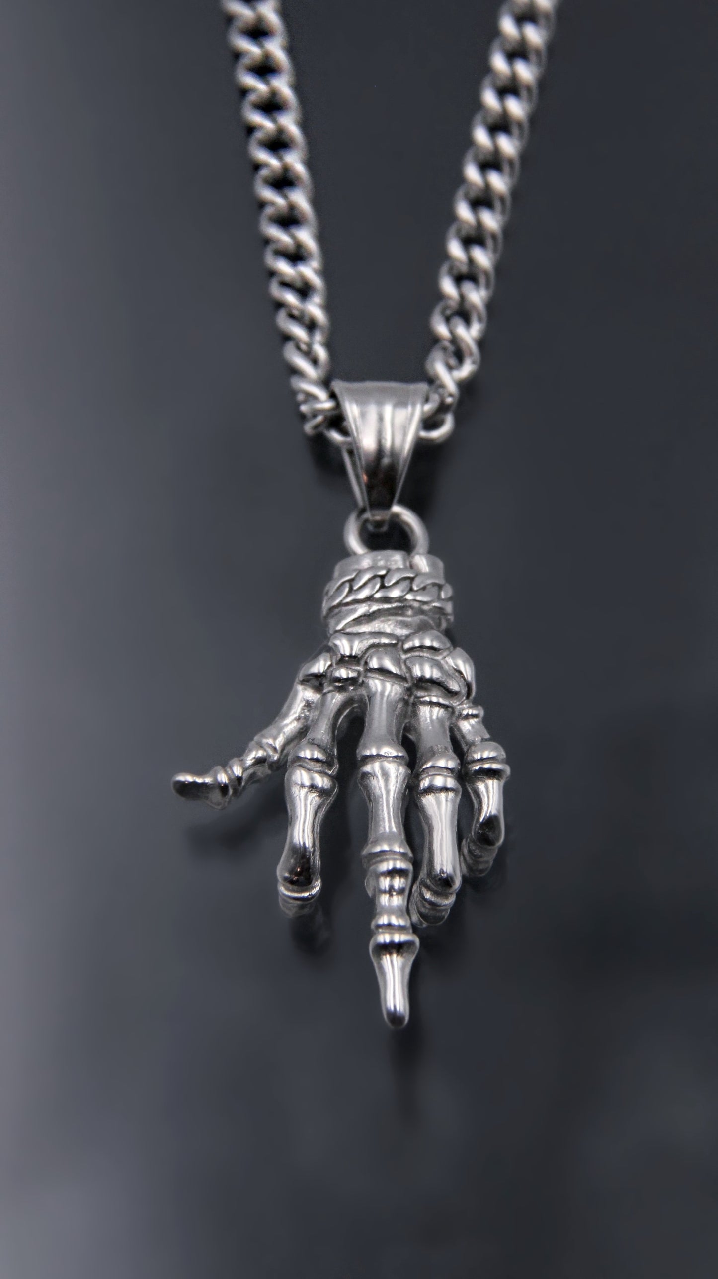 SKELETON MIDDLE FINGER NECKLACE