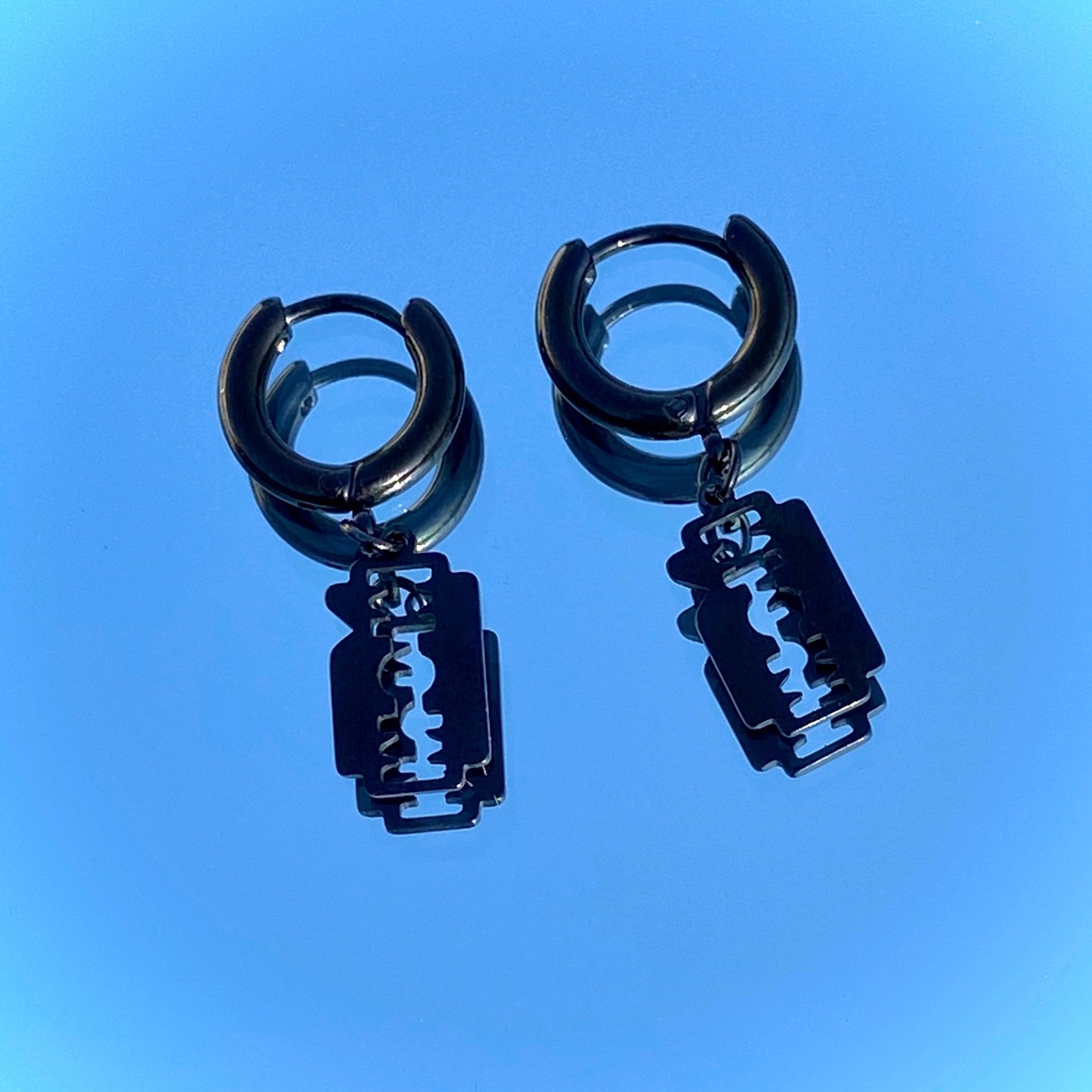 BLACK RAZOR EARRINGS