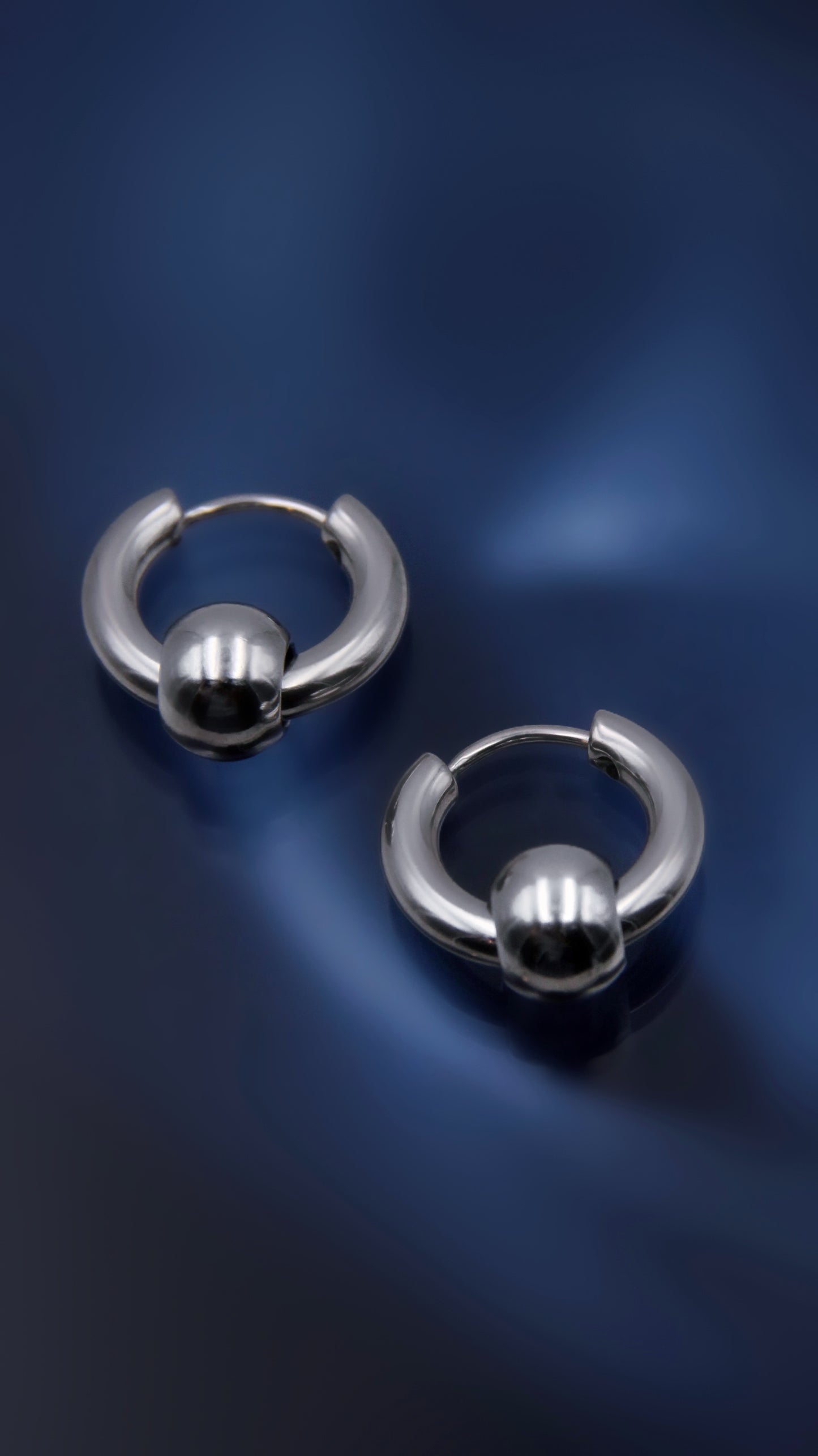 CAPTIVE BEAD EARRINGS