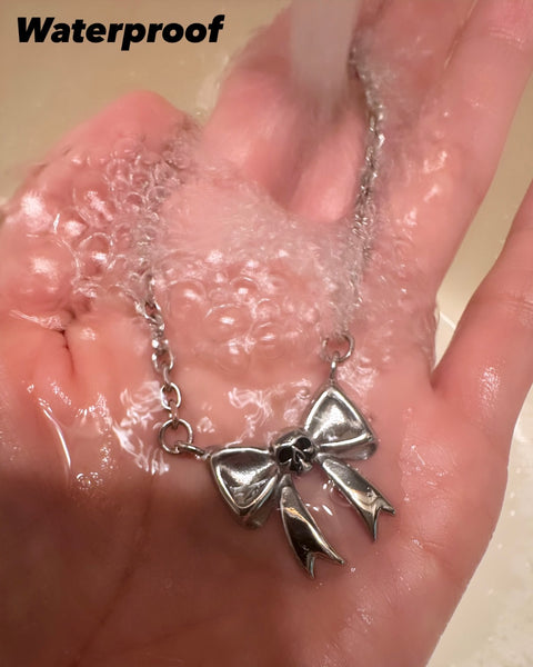 SKULL BOW NECKLACE