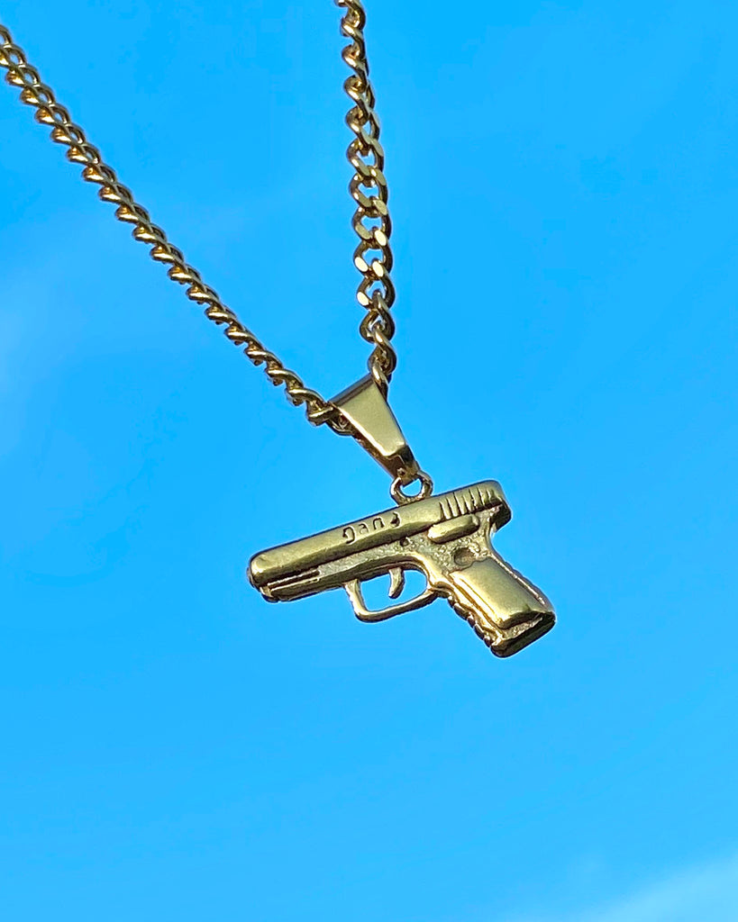 THE GOLD GLOCK NECKLACE